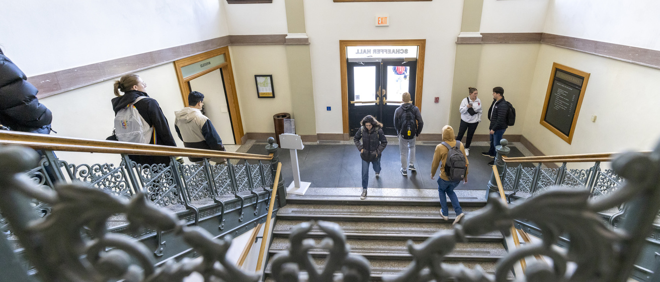 Schaeffer Hall hallway with students passing in between classes